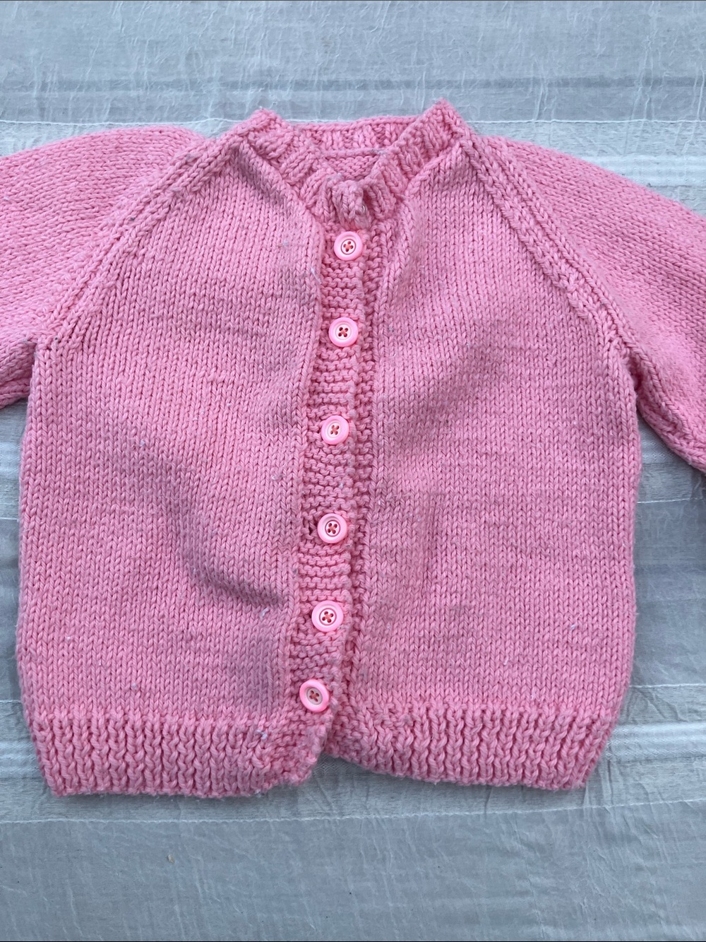 Vintage handmade child’s sweater pink with 1960s buttons